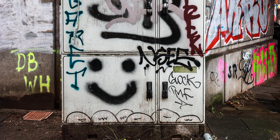An vielen Ecken Hamburgs sieht man den „Großvater des Graffiti“ noch lächeln. Der Smiley war einer seiner bekanntesten „Tags“.
